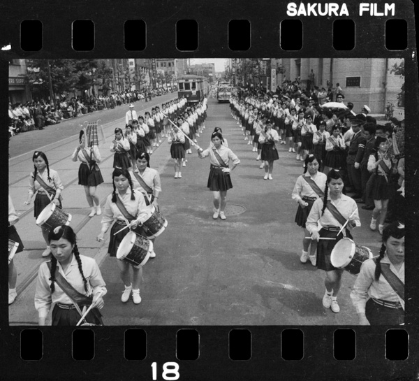 Drum and fife band of senior high school girls taking part in the parade